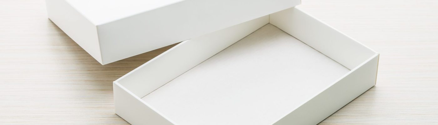 White box mock up on wooden background